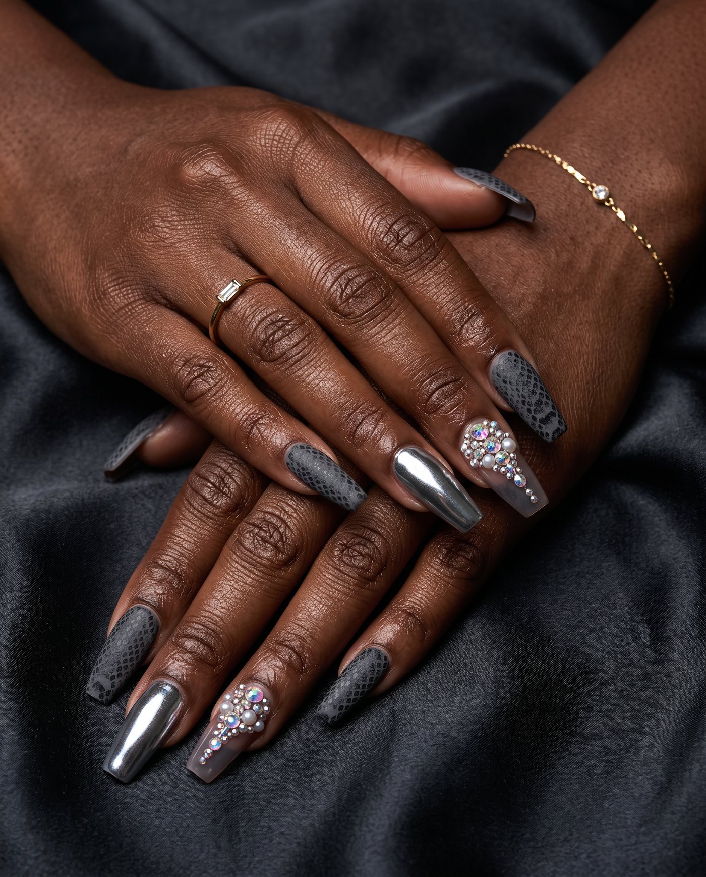 Long coffin nails in grey snakeskin, chrome and crystal finishes